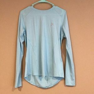 Light blue OTF workout top with back cutouts